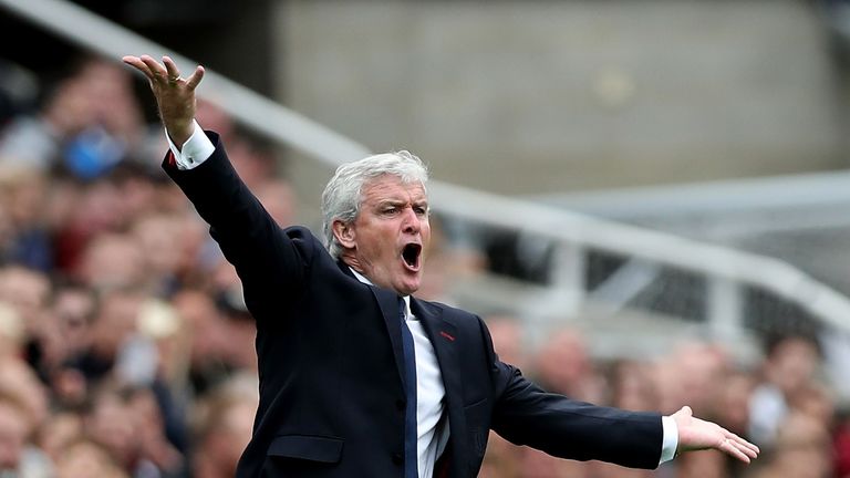 NEWCASTLE UPON TYNE, ENGLAND - SEPTEMBER 16: Mark Hughes, Manager of Stoke City reacts during the Premier League match between Newcastle United and Stoke C