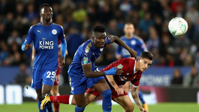 LEICESTER, ENGLAND - SEPTEMBER 19: Daniel Amartey of Leicester City and Philippe Coutinho of Liverpool battle for possession during the Carabao Cup Third R