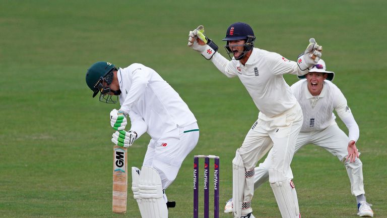 England Lions' Ben Foakes and Keaton Jennings appeal successfully for the wicket of South Africa A's Duanne Olivier