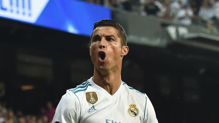 Cristiano Ronaldo celebrates scoring Real Madrid's first goal during the UEFA Champions League group H match against APOEL