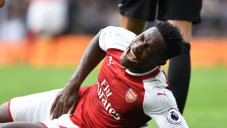 Injured Arsenal striker Danny Welbeck during the Premier League match between Chelsea and Arsenal at Stamford Bridge on September 17, 2017