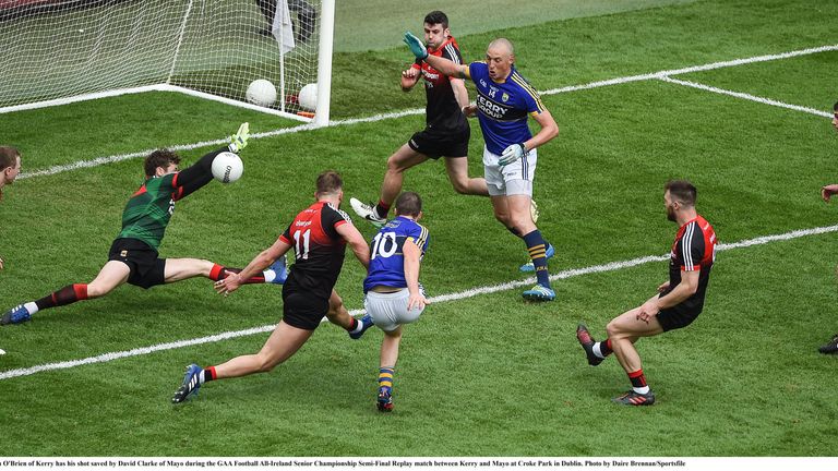 David Clarke saves  Stephen O'Brien effort in the semi-final replay.