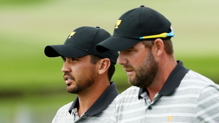Australian duo Marc Leishman (right) and Jason Day succumbed to Kevin Kisner and Phil Mickelson 1 down at the 18th 