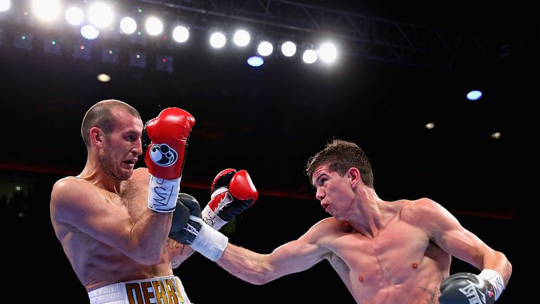 Luke Campbell of England goes for a right hand punch on Derry Mathews of England in the WBC Silver Lightweight Championsh