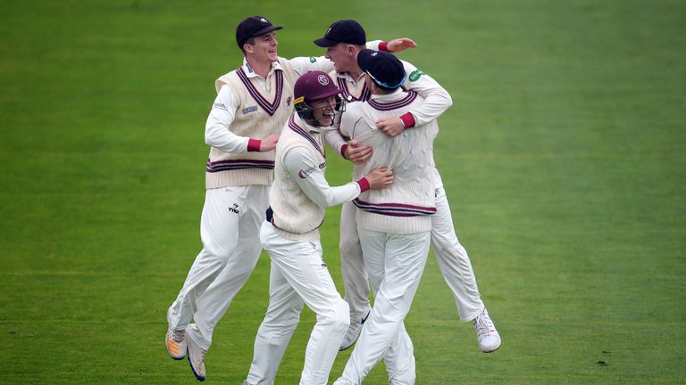 Dom Bess of Somerset (2R) celebrates after running out John Simpson of Middlesex