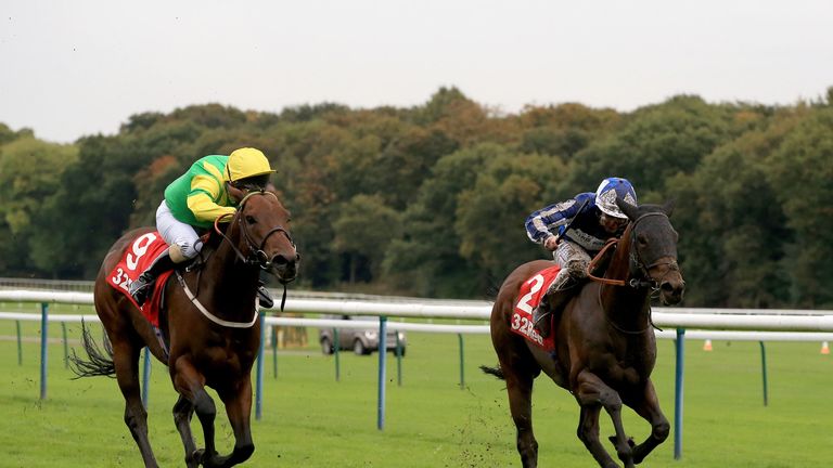 Donjuan Triumphant (right) wins the 32Red Gold Cup at Haydock Park Racecourse