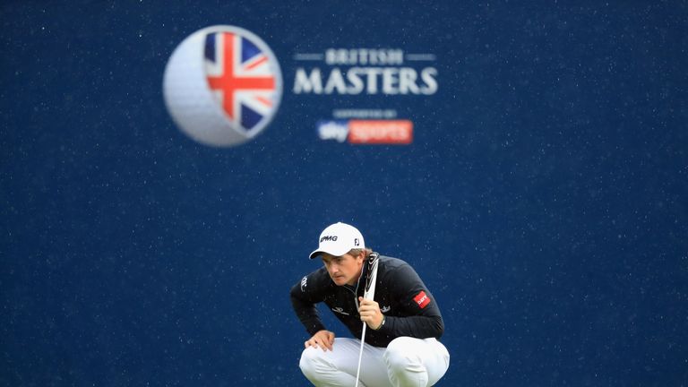 NEWCASTLE UPON TYNE, ENGLAND - SEPTEMBER 30:  Paul Dunne of Ireland lines up a putt on the 18th green during the third round of the British Masters at Clos