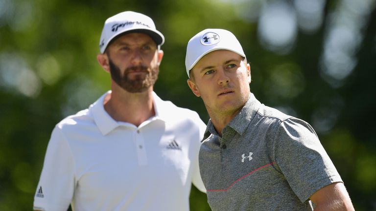 Dustin Johnson and Jordan Spieth of the United States stand on the ninth tee during round one of the Dell Technologies Championship