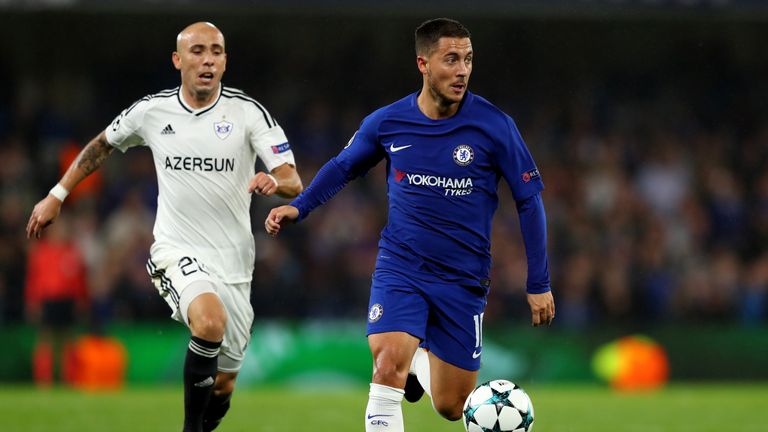 Eden Hazard of Chelsea gets away from Oliveira Richard of Qarabag FK during the UEFA Champions League Group C match