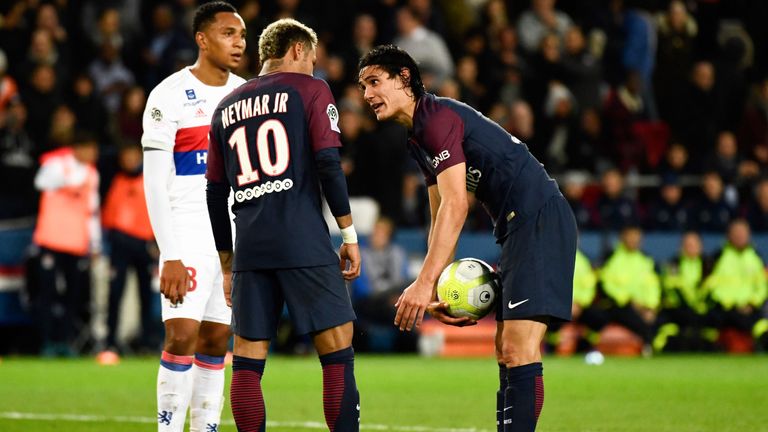 Edinson Cavani and Neymar dispute who should take the penalty during the Ligue 1 match against Lyon at Parc des Prince