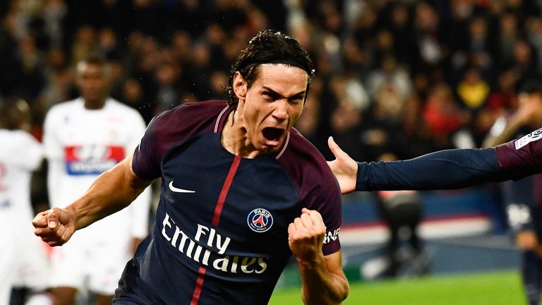 Edinson Cavani celebrates scoring the opening goal during the French Ligue 1 match between PSG and Lyon