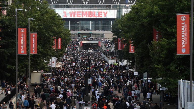 LONDON, ENGLAND - SEPTEMBER 04:  Fans walk along Wembley Way towards the stadium prior to the FIFA 2018 World Cup Qualifier between England and Slovakia at