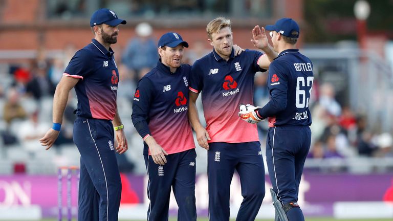 England's David Willey celebrates taking the wicket of West Indies' Devendra Bishoo during the first Royal London One Day International match at the Emirat