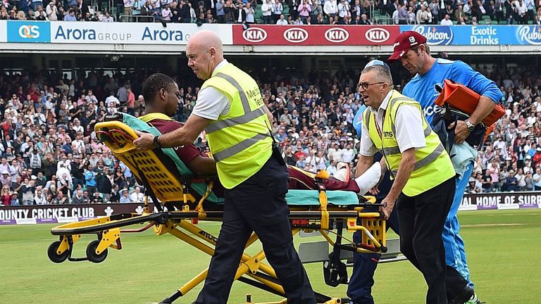 Windies opener Evin Lewis is stretchered off at the Oval 