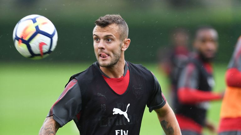 Jack Wilshere keeps his eye on the ball during a training session at London Colney on September 8, 2017