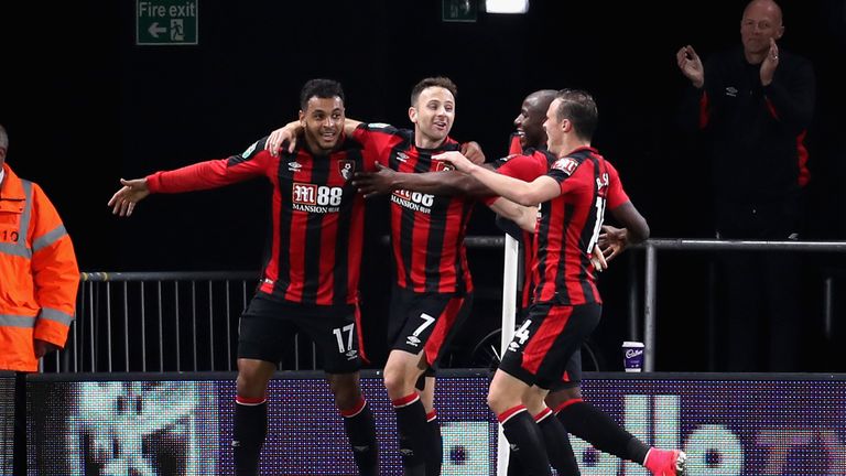 BOURNEMOUTH, ENGLAND - SEPTEMBER 19:  Joshua King of AFC Bournemouth celebrates scoring his sides first goal with team mates during the Carabao Cup Third R