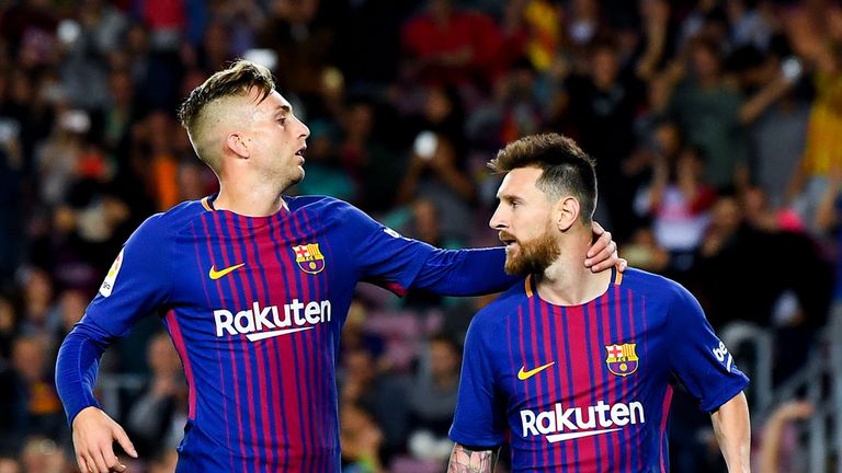 Lionel Messi of FC Barcelona celebrates with his team-mate Gerard Deulofeu of FC Barcelona after scoring his team's first goal v Eibar