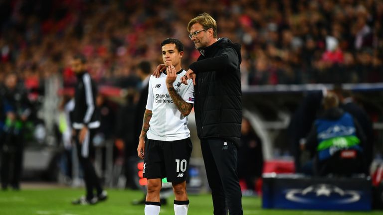 Jurgen Klopp (right) speaks to Philippe Coutinho during the draw at Spartak Moscow