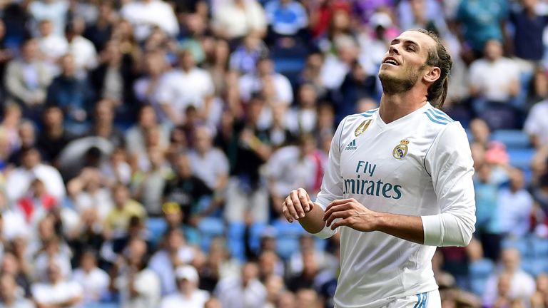 Real Madrid's Welsh forward Gareth Bale gestures after missing a goal during the Spanish Liga football match Real Madrid vs Levante at the Santiago Bernabe