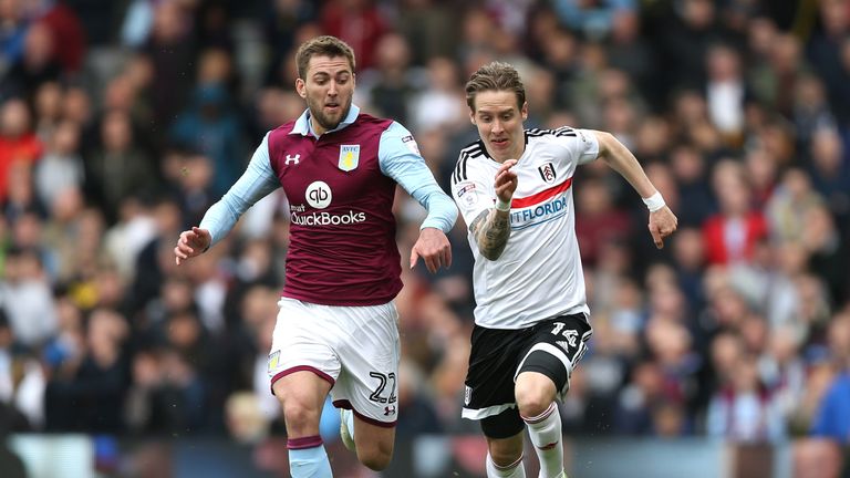 LONDON, ENGLAND - APRIL 17:  Gary Gardner of Aston Villa and Stefan Johansen of Fulham in action during the Sky Bet Championship match between Fulham and A
