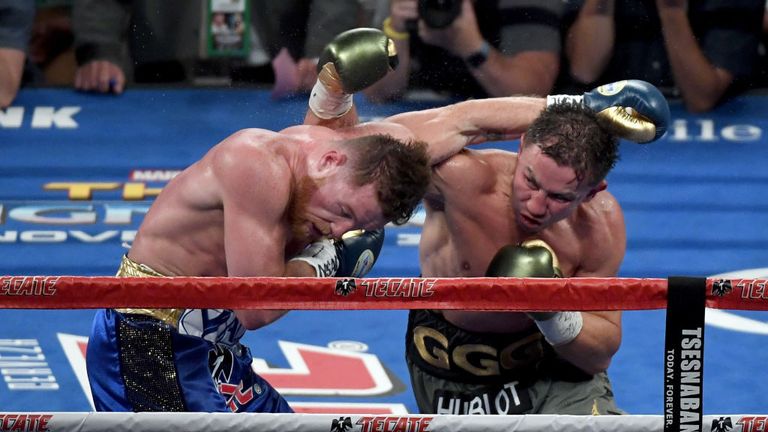 Canelo Alvarez and Gennady Golovkin exchange blows during their WBC, WBA and IBF middleweight championionship bout