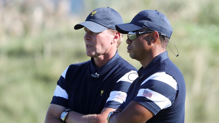 JERSEY CITY, NJ - SEPTEMBER 28:  Captain's assistant Tiger Woods and Captain Steve Stricker of the U.S. Team talk during Thursday foursome matches of the P