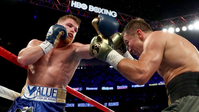  Canelo Alvarez throws a punch at Gennady Golovkin during their WBC, WBA and IBF middleweight championionship bou