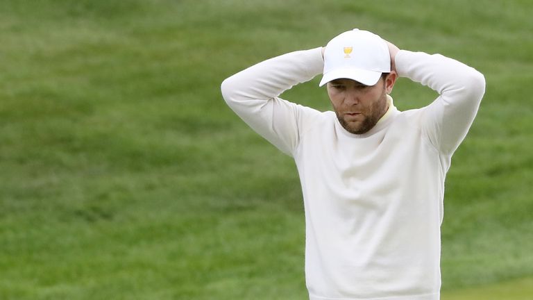 JERSEY CITY, NJ - SEPTEMBER 30:  Branden Grace of South Africa and the International Team reacts on the 15th green during Saturday foursome matches of the 