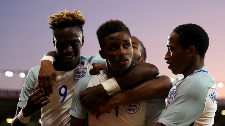 BOURNEMOUTH, ENGLAND - SEPTEMBER 05:  Demarai Gray (C) of England celebrates scoring the 1st England goal with Tammy Abraham (L) and Kyle Walker-Peters dur