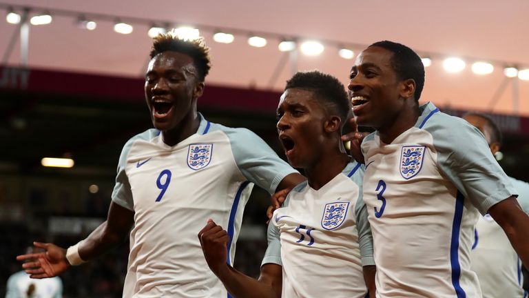 BOURNEMOUTH, ENGLAND - SEPTEMBER 05:  Demarai Gray (C) of England celebrates scoring the 1st England goal with Tammy Abraham (L) and Kyle Walker-Peters dur