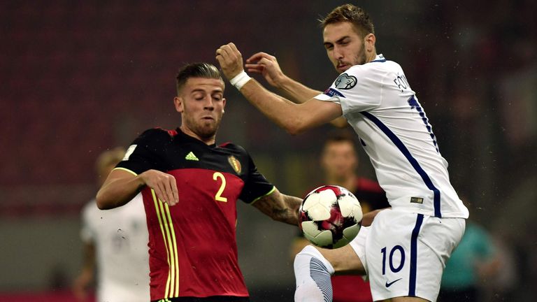 Greece's Konstantinos Fortounis (R) fights for the ball with Belgium's Toby Alderweireld during their Group H 2018 FIFA World Cup qualifier