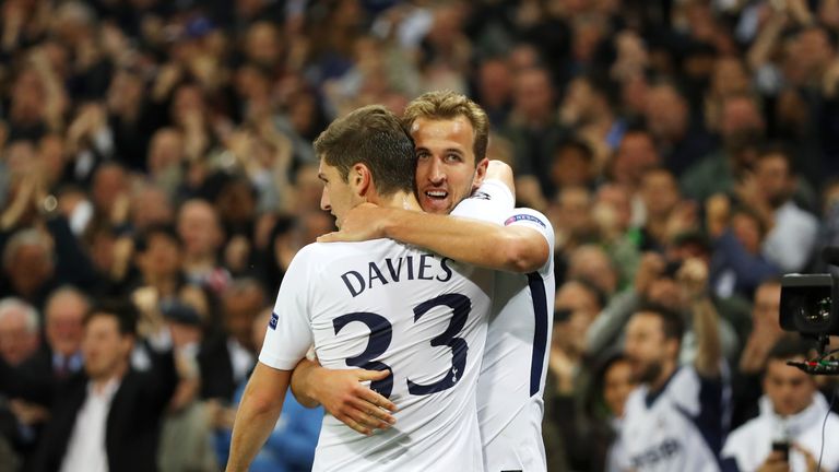 Harry Kane celebrates with team-mate Ben Davies after scoring his Tottenham's's third goal 