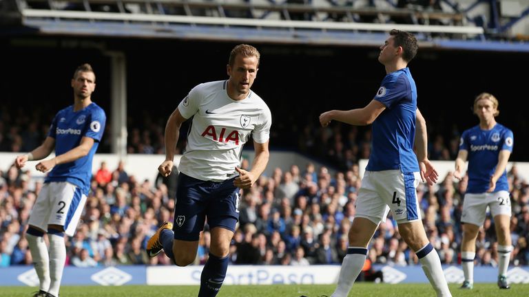 Harry Kane of Tottenham Hotspur celebrates scoring his sides third goal against Everton