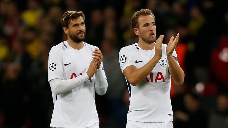 Fernando Llorente and Harry Kane applaud fans after the Champions League match against Borussia Dortmund