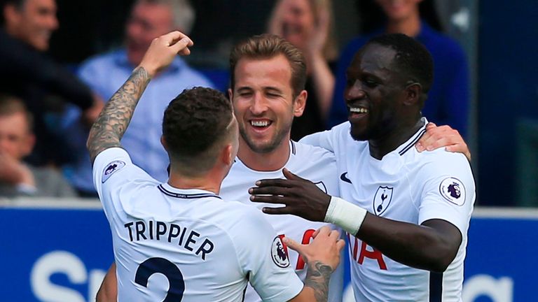 Harry Kane is congratulated by team-mates after scoring the opening goal