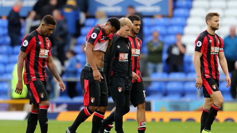 LIVERPOOL, ENGLAND - SEPTEMBER 23: Eddie Howe, Manager of AFC Bournemouth and his players walk off dejected after the Premier League match between Everton 