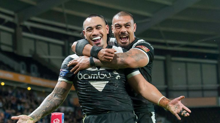 Kingston upon Hull, England - Hull FC's Mahe Fonua is congratulated by Sika Manu on his try against Wigan.