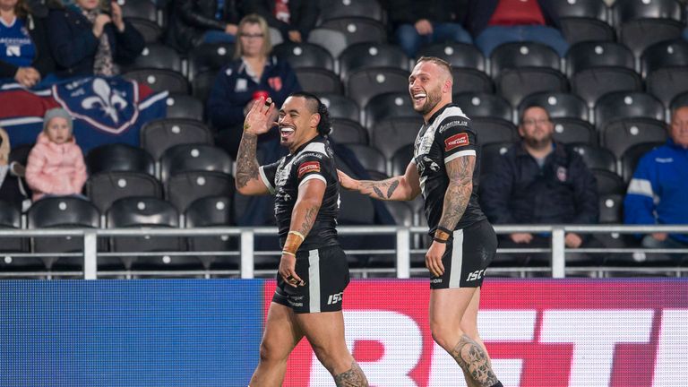 Mahe Fonua celebrates his first-half try with Josh Griffin