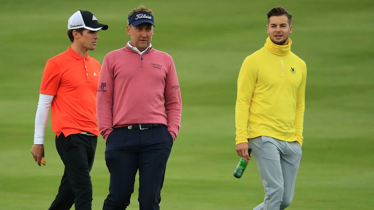 NEWCASTLE UPON TYNE, ENGLAND - SEPTEMBER 27:  Ian Poulter of England walks with TV personalities Gary Beadle (L) and Chris Hughes during the pro am ahead o