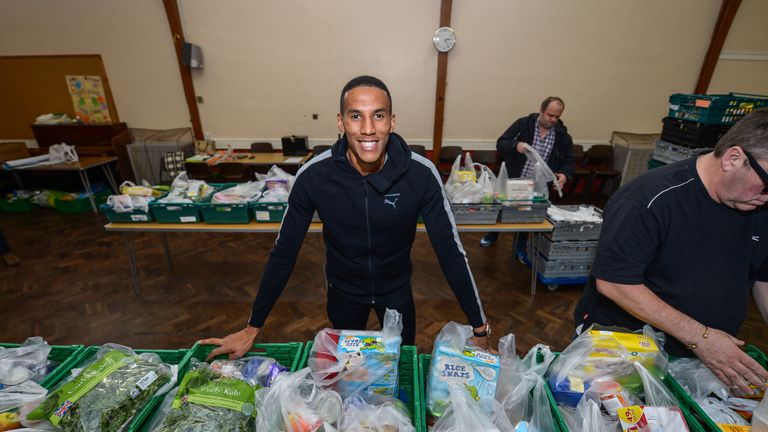 NEWCASTLE, ENGLAND - SEPTEMBER 14: Isaac Hayden of Newcastle United poses for photos during a visit to Newcastle West End Foodbank  on September 14, 2017, 