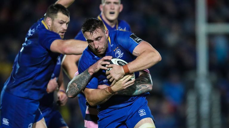 Leinster earned a bonus point win against the Cardiff Blues after a late blitz 
