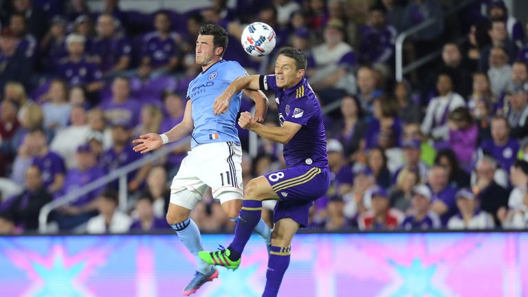 ORLANDO, FL - MARCH 05:  Jack Harrison #11 of New York City FC and Will Johnson #8 of Orlando City SC fight for the ball during a MLS soccer match between 