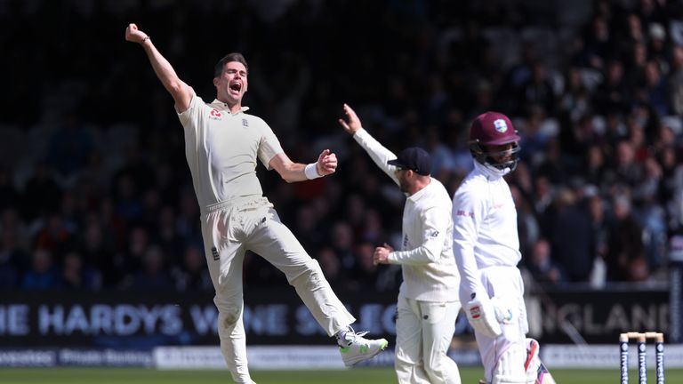 James Anderson of England celebrates after taking his fifth wicket of the West Indies second innings during day three