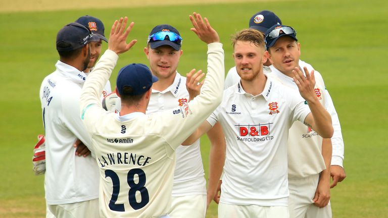 Jamie Porter of Essex celebrates taking a wicket