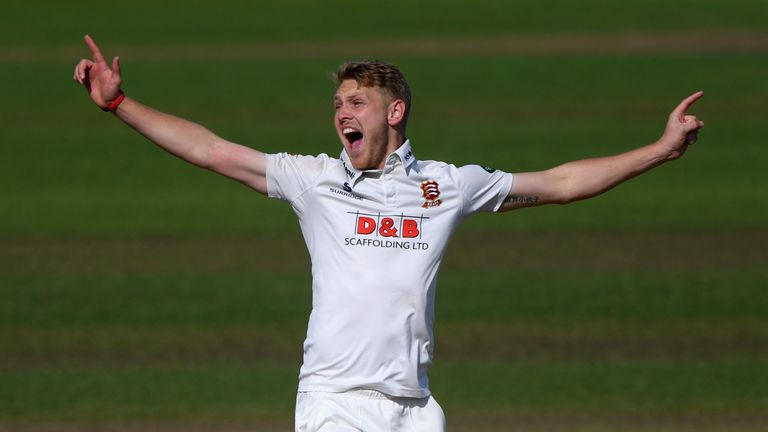 Essex bowler Jamie Porter celebrates after dismissing Jonathan Trott during day one of the Specsavers County Championship