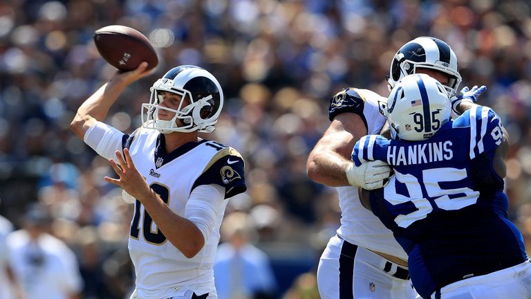LOS ANGELES, CA - SEPTEMBER 10:   Jared Goff #16 of the Los Angeles Rams passes the ball under pressure from  Johnathan Hankins #95 of the Indianapolis Col