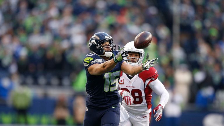 SEATTLE, WA - DECEMBER 24:  Wide receiver Jermaine Kearse #15 of the Seattle Seahawks can't hang on to a pass against the Arizona Cardinals at CenturyLink 