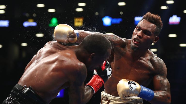 Jermell Charlo punches Charles Hatley during their WBC super-welterweight title bout at the Barclays Center on April 22, 2017.