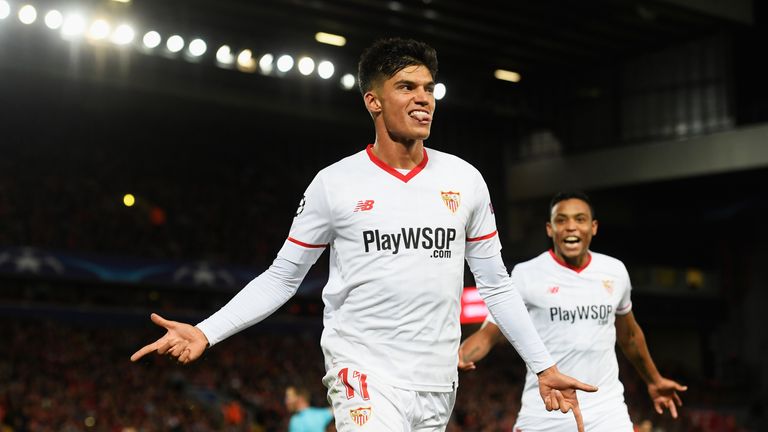 LIVERPOOL, ENGLAND - SEPTEMBER 13:  Joaquin Correa of Sevilla celebrates scoring his sides second goal during the UEFA Champions League group E match betwe
