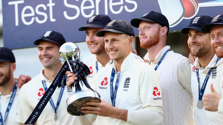 LONDON, ENGLAND - SEPTEMBER 09: Joe Root is surround by his teammates during the trophy presentation after England win during England v West Indies - 3rd I